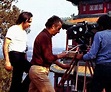 Michelangelo Antonioni (centre) shooting in China during the making of ...