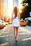 Girl walking on New York City street | High-Quality People Images ...