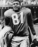 Sporting News: Dick Lane of the Detroit Lions leaves the field at...