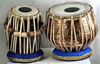 Tabla drums are typically an Indian instrument that are played by using ...