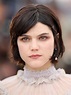 French singer and actress Soko wore a light base with her bob pinned ...