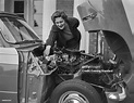 Diana Keppel, Countess of Albemarle working on the engine of a car ...