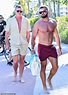 Luke Evans and his boyfriend Fran Thomas flaunt their muscle-bound ...