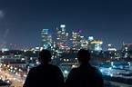 Royalty-Free photo: Two men viewing the city at night | PickPik