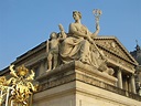 Versailles, France - Statues at the entrance of the Versailles Palace ...