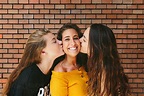 "Two Girls Kissing Their Happy Best Friend" by Stocksy Contributor ...