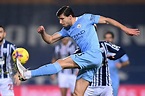 Man City's Ruben Dias named player of the year by football writers ...