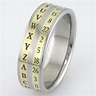 Here's a decoder ring in titanium and 18k gold. from www.boonerings.com
