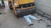 Man crushed by steamroller in brutal accident - YouTube