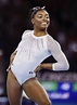 Simone Biles Poses in a Floral Swimsuit Showing Her Stunning Abs ...