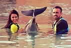 In pictures: Jose Enrique and girlfriend Amy Jaine swim with dolphins ...