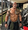 Dwayne 'The Rock' Johnson goes shirtless as he shows off his bulging ...