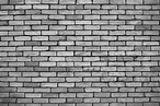 Fondo gris, muro de piedra de ladrillo | Foto Premium