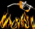Feeding The Flame Gasoline On Fire Stock Photo - Download Image Now ...