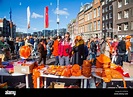 Celebrating Queens day in the Netherlands. Flee market stands in the ...