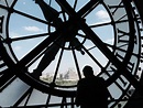 Clock window in Musee d'Orsay, with Louvre across the Seine