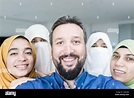 Muslim man with 4 wives portrait ,quality photo Stock Photo - Alamy