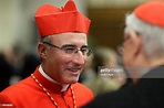Newly elected cardinal Daniel Fernando Sturla Berhouet is greeted by ...
