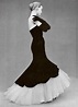 Model in Balenciaga's flamenco inspired evening gown of black velvet ...