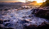 Ocean Waves Crashing on Rocks during Sunset · Free Stock Photo