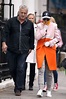 Rita Ora sports a multi-coloured coat while on a stroll with her father ...