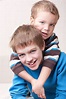Portrait of two brothers stock photo. Image of look, sofa - 17791800