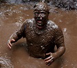 Runners trawl up to their necks in mud for 10K Muddy Trials | Daily ...