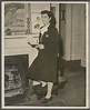 Portrait of Martha Sharp standing next to a fireplace. - Collections ...