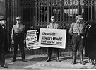 SA pickets, wearing boycott signs, block the entrance to a Jewish-owned ...