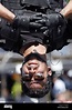 David Blaine hangs upside down while performing his "Dive of Death ...