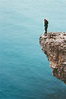 Traveler standing on cliff edge | High-Quality People Images ~ Creative ...