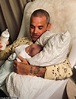 Robbie Williams holds his two-year-old daughter's hand in adorable ...