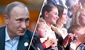 Putin's 'lover' Alina Kabaeva pictured with children wearing wedding ...