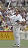 Matthew Hayden acknowledges the applause after reaching his first Test ...