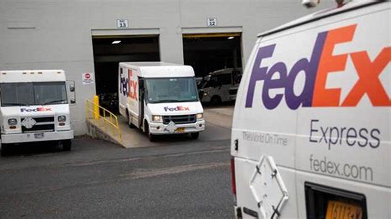 A Delivery Truck Leaves A Fedex Express Facility In Garden City, New York, On Nov., 2024