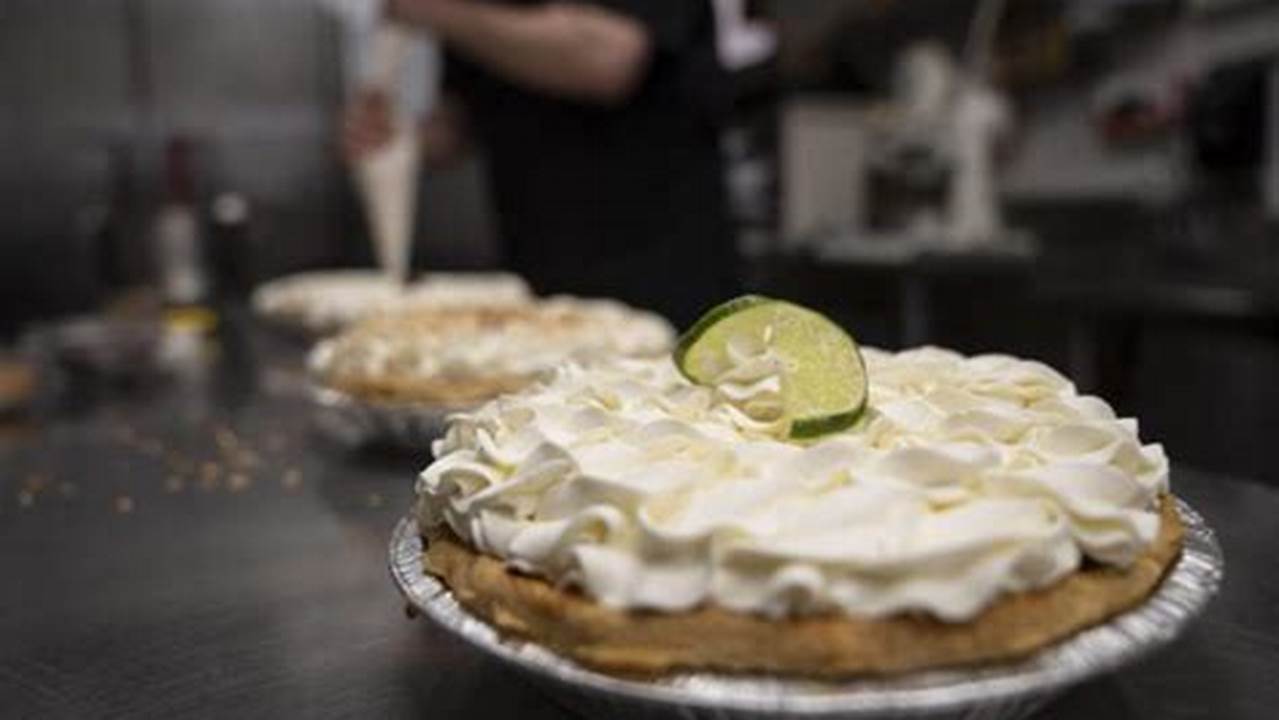 A Freshly Decorated Key Lime Pie Rests On A Counter In A Busy Bakery Kitchen At Michele&#039;s Pies, Wednesday, March 13, 2024, In Norwalk, Conn., 2024
