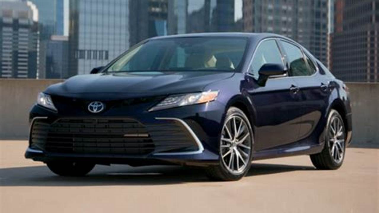 A Toyota Camry Hybrid Is Offered For Sale At A Dealership On Feb., 2024