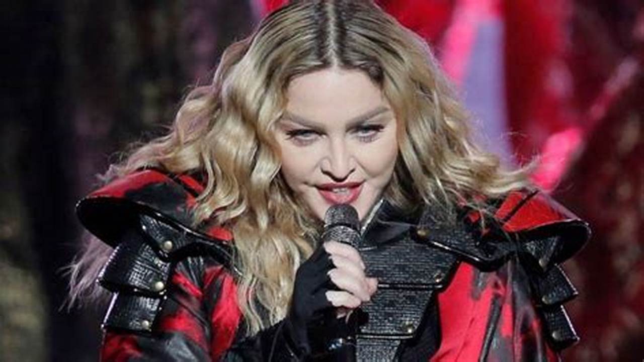 Madonna Falls Off Chair And Laughs During Open Your Heart In Seattle., 2024