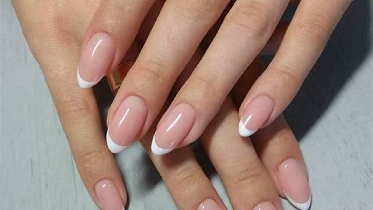 The Classic French Manicure Has Been Given A Modern Update For 2024, With Pastel Shades And Monochrome Designs Proving To Be Particularly Popular., 2024