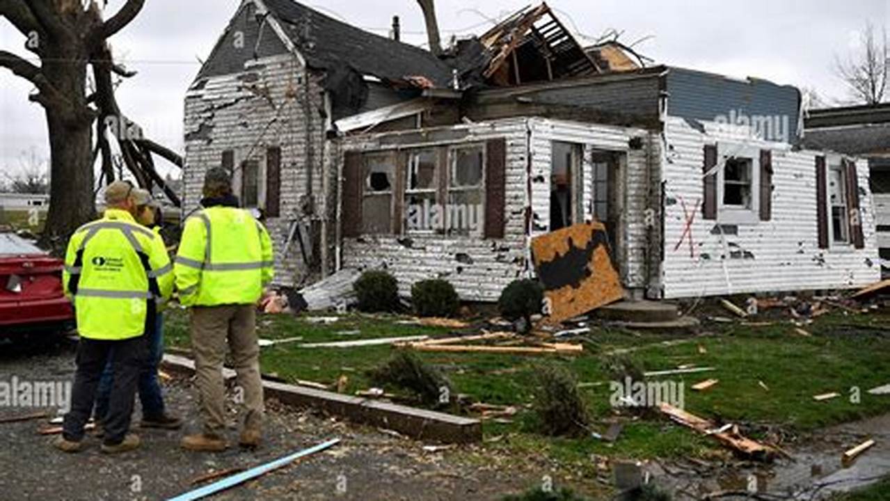 Volunteer Workers Look Over A House That Was Destroyed By A Tornado In Lakeview, Ohio, Friday, March 15, 2024., 2024