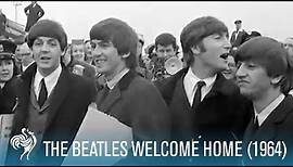 The Beatles Welcome Home to England (1964) | British Pathé