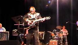 GENE STEWART, "The Country Rebel" singing "Guitars and Cadillacs"