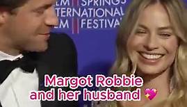 Margot Robbie and Tom Ackerley