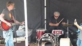 Charlie Grima drumming with The Lewis Project at Festival Fair...