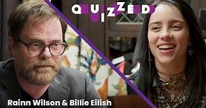 Billie Eilish gets QUIZZED by Rainn Wilson on ‘The Office' | Billboard