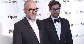 Michael Stipe and Thomas Dozol look pensive in March 2012
