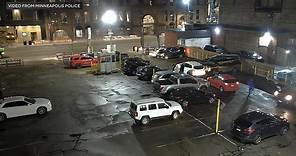 Raw video: Surveillance vid tracks parking lot shooting suspect grabbing gun from car