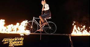 Jade Kindar-Martin Rides Bike Across High Wire on FIRE! Will He Make It Across?