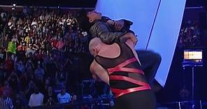 Kane chokeslams Eric Bischoff off the stage