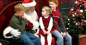 Military dad surprises children visiting mall Santa